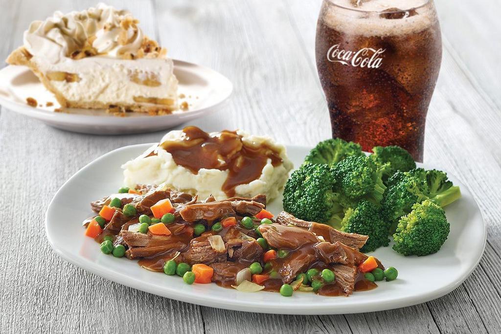 Classic Pot Roast · Tender chunks of braised beef, sweet green peas, tender carrots, onions and a hearty beef gravy. Served with two dinner sides, beverage & Perkins Pie slice of your choice.