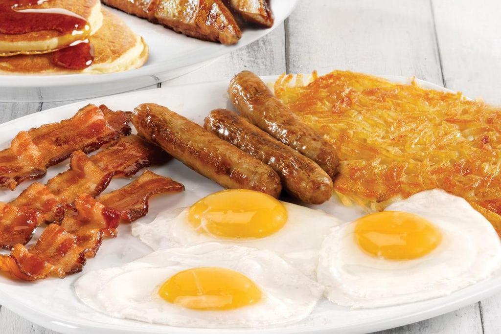 Triple Egg Dare Ya · Three eggs*, three Applewood smoked bacon strips, three sausage links, two made-from-scratch buttermilk pancakes, two slices of French toast and choice of crispy hash browns or breakfast potatoes. .