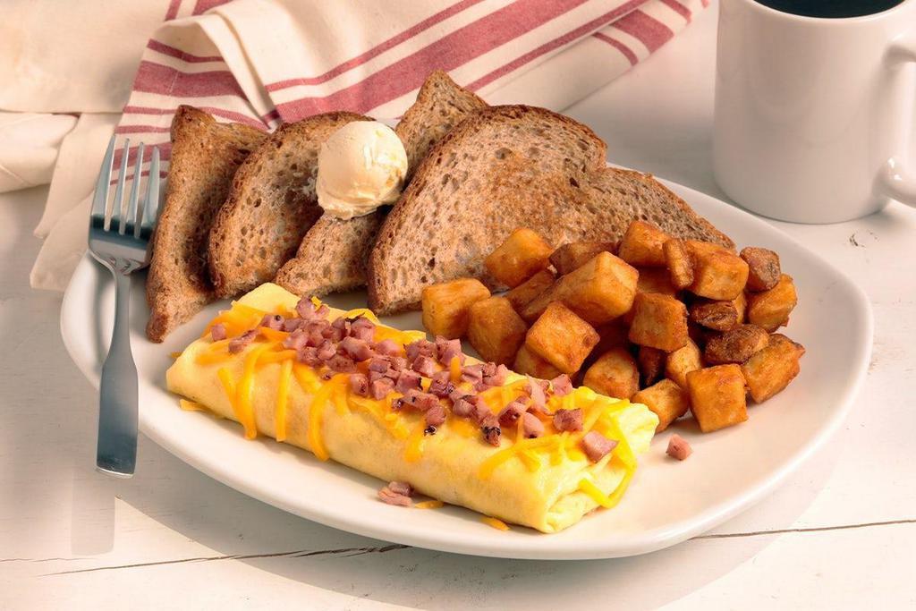 Build-Your-Own Omelet · Choose any two ingredients   . Additional charge for each additional ingredient:  Diced Ham, Sausage, Applewood Smoked Bacon, American Cheese, Swiss Cheese,  Cheddar Cheese, Pepper Jack Cheese, Hollandaise Sauce, Mushrooms, Tomatoes, Onions, Green Peppers. .