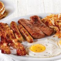 Hearty Man'S Combo · Two eggs*, smoked sausage, two Applewood smoked bacon strips and two sausage links. Served w...