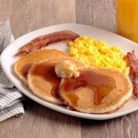 Magnificent Seven®  · Two eggs*, two Applewood smoked bacon strips and three buttermilk pancakes..