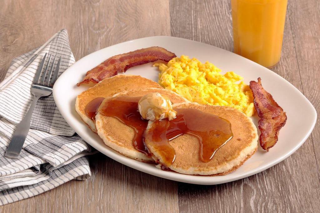 Magnificent Seven®  · Two eggs*, two Applewood smoked bacon strips and three buttermilk pancakes..