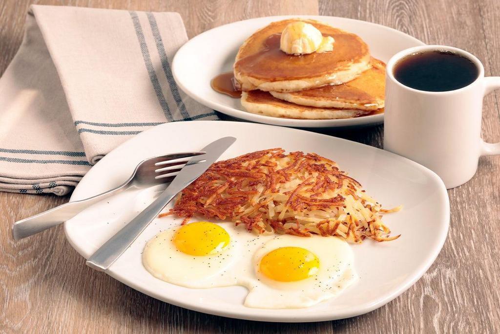 Twice & Nice Combo · Two eggs* with crispy hash browns and three buttermilk pancakes.
