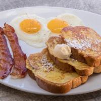 French Toast Platter · Three slices of Vienna bread dipped in our signature batter, grilled and sprinkled with powd...