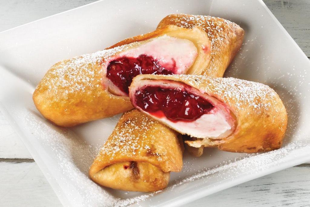 Strawberry & Cream Cheese Crispers · Delicious strawberries and sweet cream cheese tucked inside two hand-rolled wraps, lightly fried and dusted with powdered sugar.