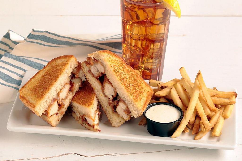 Chicken Strips Melt · Crispy chicken strips, Applewood smoked bacon and melted Pepper Jack cheese with Ranch dressing served on grilled sourdough bread..