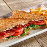 Big Bacon Blt · Six strips of crisp Applewood smoked bacon with lettuce, tomato and mayo on white or whole w...