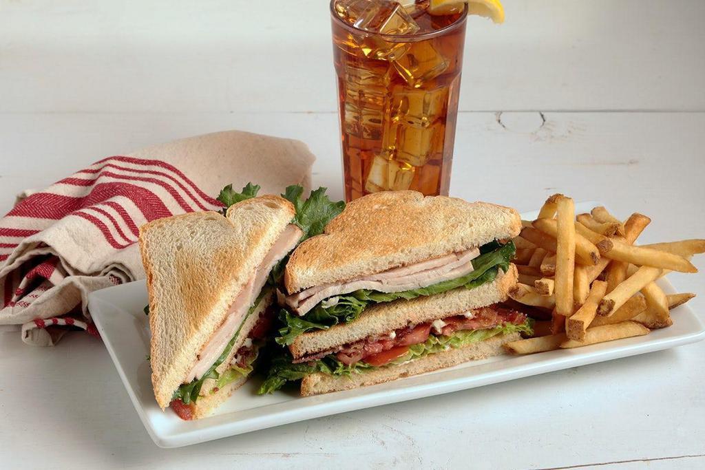 Triple Decker Club · Butterball® oven-roasted turkey, Applewood smoked bacon, tomato, lettuce, and mayonnaise on white or whole wheat toast..