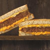 Patty Melt · USDA Angus beef patty with sautéed onions and. Cheddar cheese on grilled rye bread.