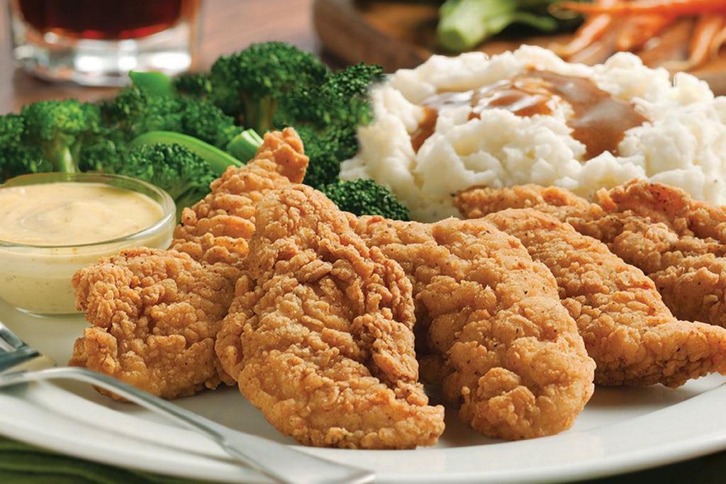 Chicken Strips Dinner · Our crispy, all white meat chicken breast strips are served with Honey Mustard dipping sauce and choice of two sides..