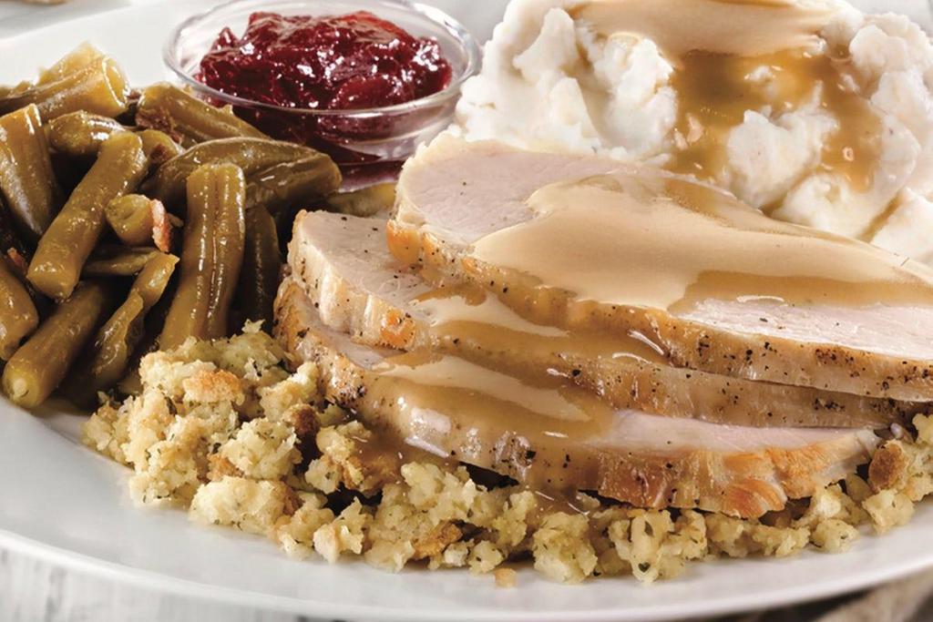 Butterball® Turkey & Stuffing · Oven-roasted slices of turkey breast served on our seasoned sage stuffing and topped with hearty turkey gravy.  Served with tangy cranberry sauce and choice of two dinner sides..