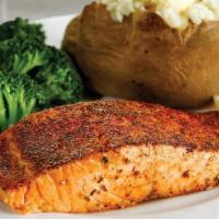 Grilled Salmon · Flaky, tender fillet- Cajun or Garlic-seasoned, or Teriyaki-glazed.  Served with two sides.