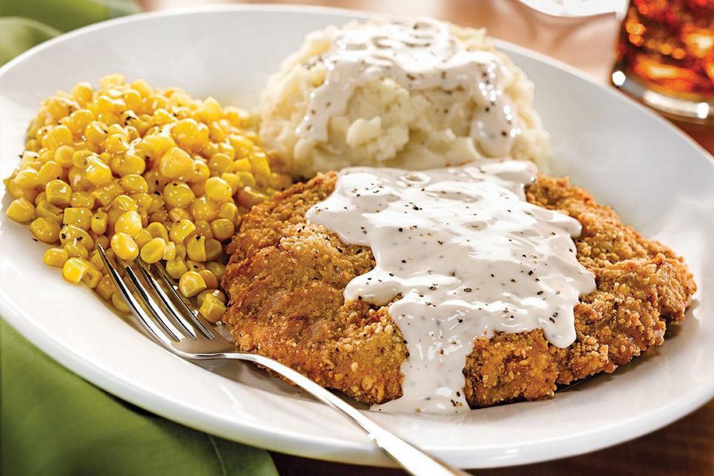Country Fried Steak · Lightly breaded steak topped with our country-style cream gravy and served with two dinner sides..