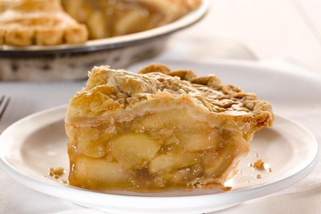 Homestyle Apple Pie, Slice · Juicy sweet apples baked fresh inside a golden flaky crust. (570 cal/slice).