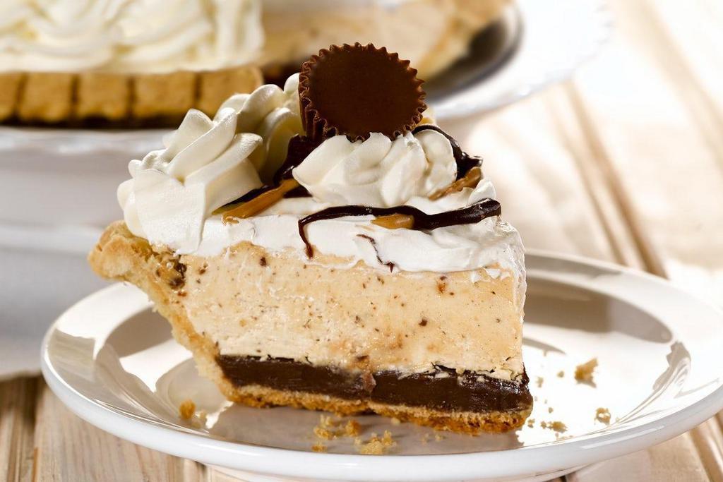 Peanut Butter Silk Pie, Slice · Layers of chocolate, peanut butter silk, real whipped cream and mini chocolate peanut butter cups. (930 cal/slice).