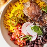 Slow Roasted Smoked Pork Bowl · Tumeric rice, black beans, pickled jalapenos, pico de gallo, cilantro, pickled red onions, c...