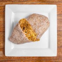 Carne Molida Burrito · Seasoned ground carne molida, yellow Mexican rice, vegan cheddar, Colombian red beanss, sour...