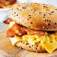 The Bacon, Egg, And Cheese Bagel · Fresh eggs, bacon, and creamy cheese stuffed in between a bagel of your choice. Choice of ad...