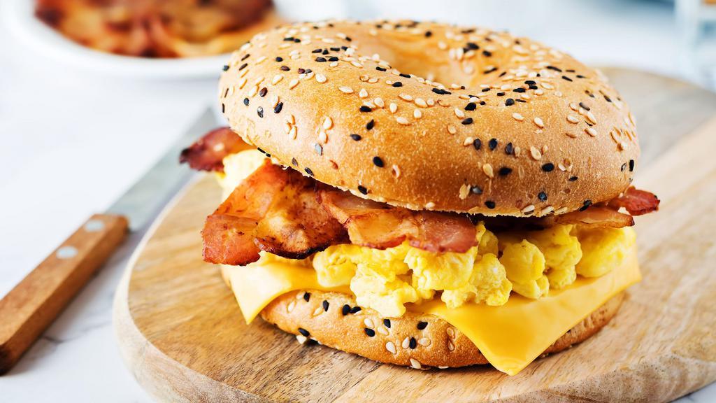 The Bacon, Egg, And Cheese Bagel · Fresh eggs, bacon, and creamy cheese stuffed in between a bagel of your choice. Choice of add-ons available.