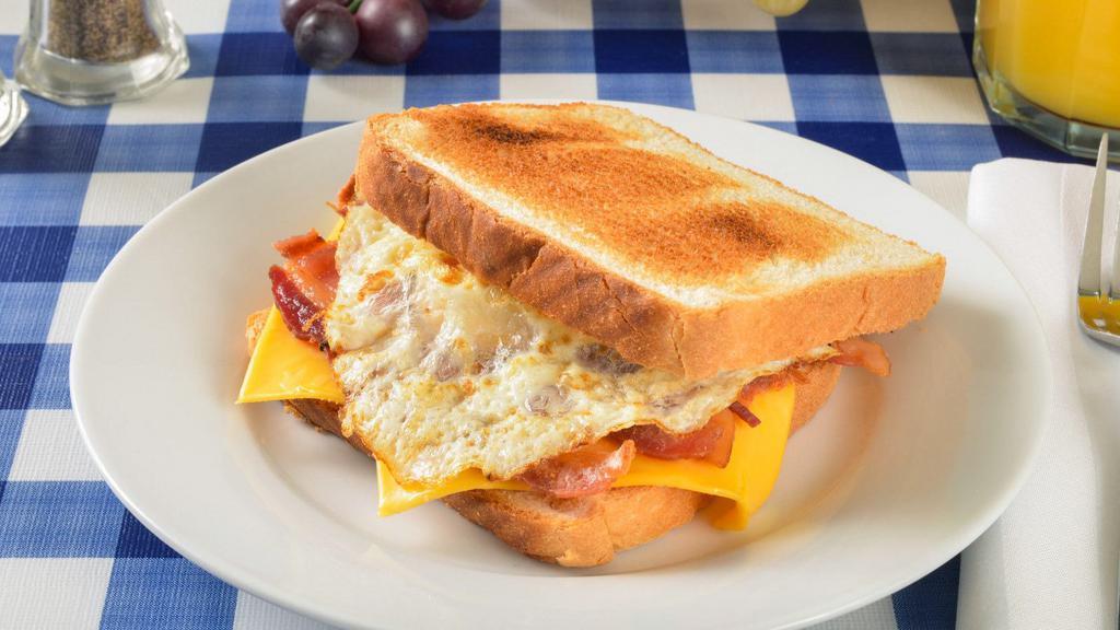 The Bacon Egg, And Cheese Sandwich · Fresh eggs, bacon, and creamy cheese stuffed in between sandwich bread of your choice. Choice of add-ons available.