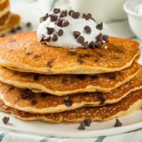Chocolate Chips Buttermilk Pancakes · 3 perfectly fluffy chocolate chip pancakes served with a side of butter and syrup. Choice of...