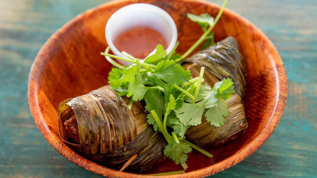 Pandan Chicken (3 Pieces) · three minced chicken triangles wrapped w/ aromatic pandan leaves, cilantro, sweet chili sauce (Please unwrap before eating)