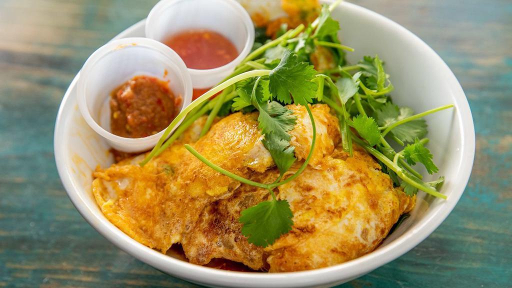 Oh-Chien · pan-fried oyster omelette, cilantro, house sambal sauce, sweet chili sauce