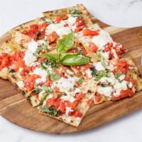Margherita Pizzetta · Mozzarella di bufala & San Marzano tomatoes