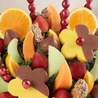 Abundant Fruit & Chocolate Tray · Fruit bouquet

our best-selling fruit arrangement is the ultimate party pleaser! Available i...