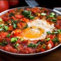 Mimi'S Shakshuka ( Veg ) · < Vegetarian option >
One of our favorites! Tomato stew, roasted onion and sunny side eggs. ...