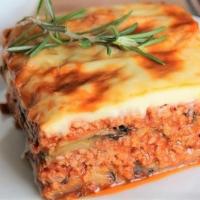 Moussaka  · Layered ground beef with grilled eggplant and bechamel sauce, cooked in the oven..just yummy!