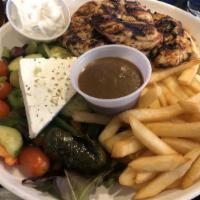 Chicken Souvlaki With French Fries Deluxe Sandwich · With Greek salad on pita open faced.
