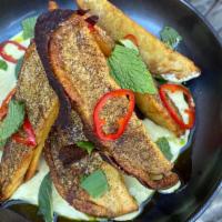 Crispy Yams · With house made lemon mayonnaise, Persian lime  oil, pickled fresno chiles.