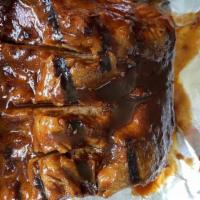 Spicy Pork Ribs · Grilled Spicy Pork Ribs With Our Special Homemade Sauce (Pork ribs only)