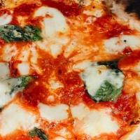 Margherita Pizza · San Marzano tomatoes, fresh mozzarella, basil, Parmigiano Reggiano D.O.P., and extra virgin ...