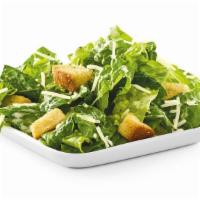 Side Traditional Caesar · Romaine lettuce, croutons and shredded Parmesan with Caesar dressing.