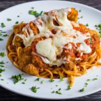 Chicken Parmigiana · Chicken breast with pasta of your choice in homemade tomato sauce baked with mozzarella chee...
