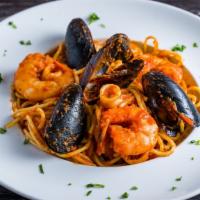 Seafood Pasta · served with shrimps , calamari & mussels in a homemade marinara sauce.