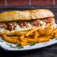 Meatballs Parmigiana Sandwich · Homemade Meatballs with homemade tomato sauce baked with mozzarella cheese.