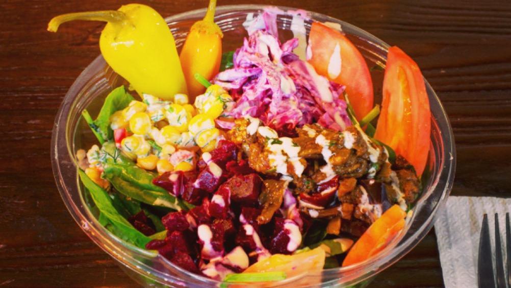 Vegeterian Salad · Salad  topped with 3 choices of sides and up to 4 toppings.