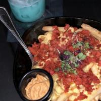 Loaded Fries Tijuana · Skin on fries, chorizo, melted cheese and chipotle mayo.