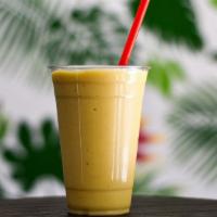 Mango Pineapple Smoothie · Mango, pineapple, banana, coconut milk, orange juice.