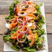 House Salad · Spring Mix / Tomato Wedges / Red Onions / Fresh Mushrooms / Oil Cured Black Olives / Homemad...