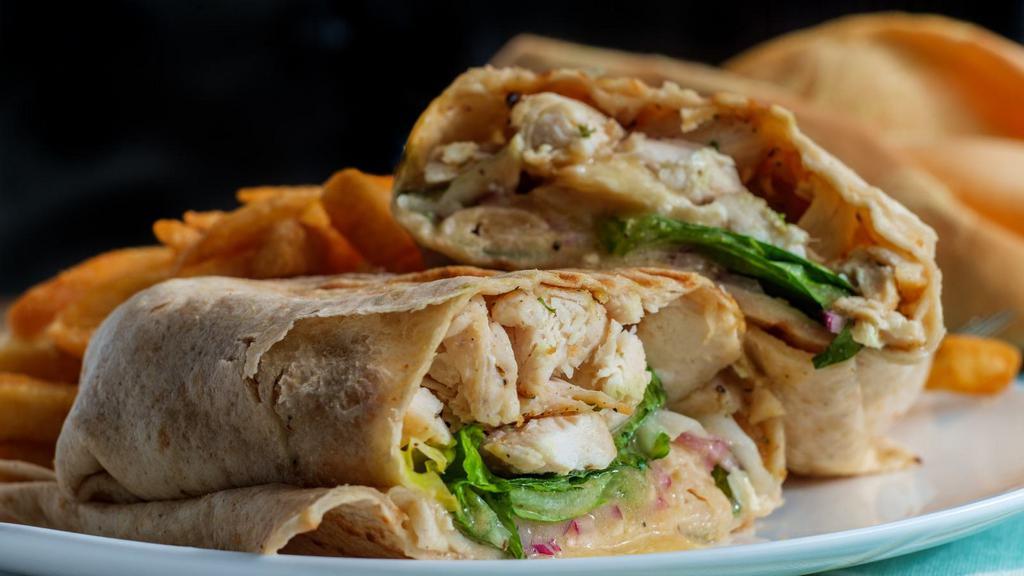 Caesar Grilled Chicken Wrap · Grilled chicken, romaine lettuce, croutons, tomato, and Caesar dressing.
