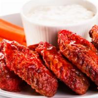 Buffalo Fried Chicken Wings · Hand-breaded chicken wings, fried and drizzled in our signature buffalo wings sauce.