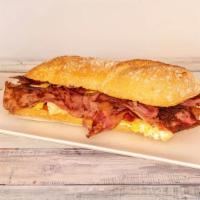 Bacon, Egg & Cheese Sandwich · Fluffy scrambled eggs crispy bacon and melted cheese on a buttery soft roll.