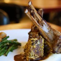 Herb Dijon Crusted Rack Of Lamb · parsnip purée, roasted tri-colored baby carrots, lamb jus