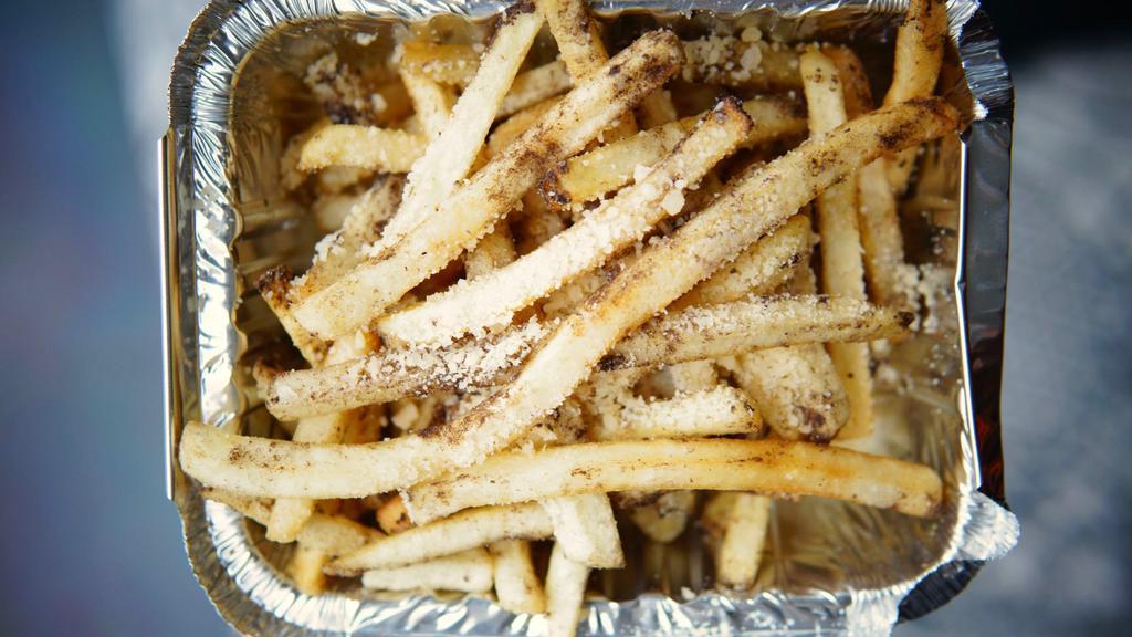 Truffle Fries · with truffle zest and parmesan