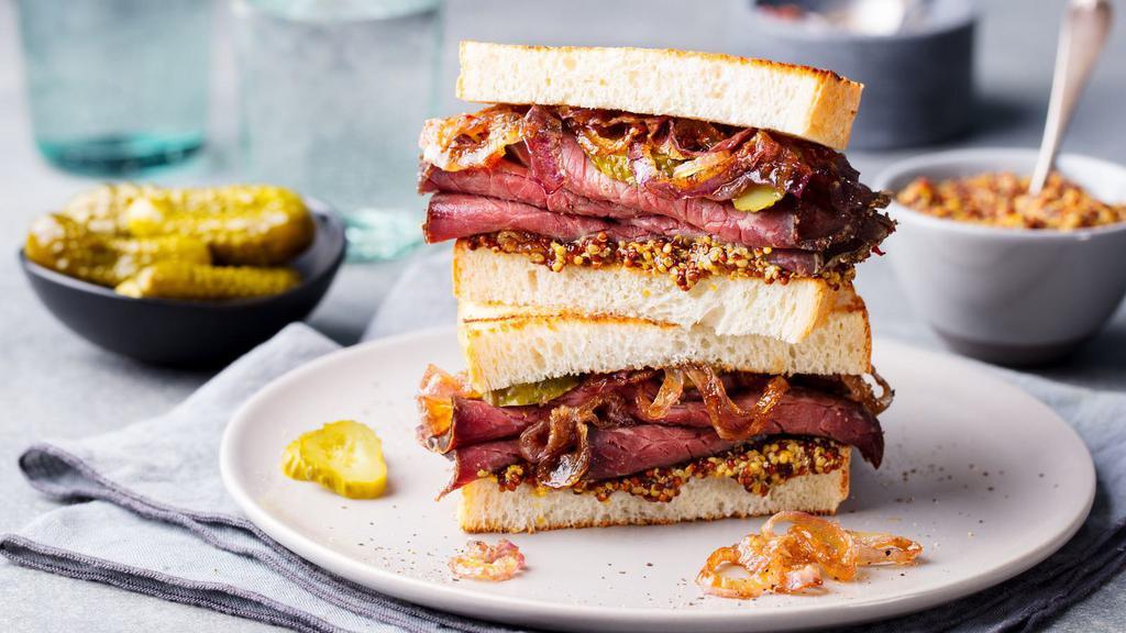 The Combo Panini · Fresh pastrami, corned beef, provolone cheese, lettuce, tomatoes, mustard and Russian dressing.