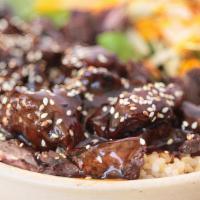 Grass Fed Steak Plate · grass fed, marinaded and grilled steak served over your choice of rice with a organic side s...
